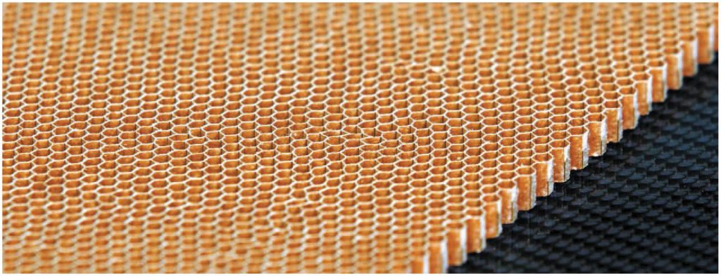 Honeycomb materials are created between individual CFRP layers to improve the strength of parts that are under high stress levels